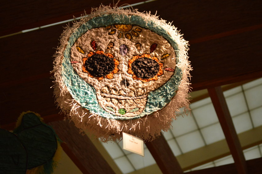 One of the piñatas on display in Smoky Hill Library, as of Sept. 14, is of a sugar skull.